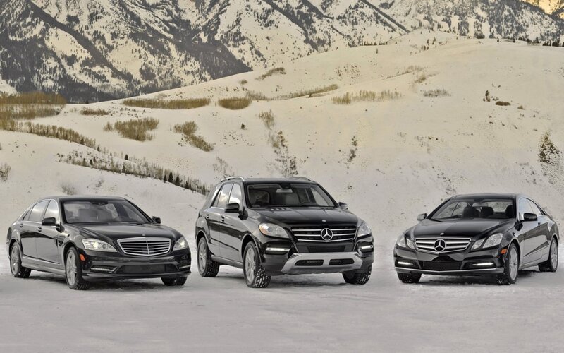 Mercedes-Benz cars in snowy landscape