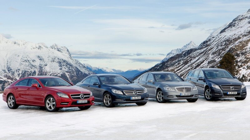 Mercedes-Benz cars in snowy mountains