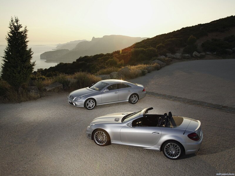 Mercedes-Benz cars on a coastal road