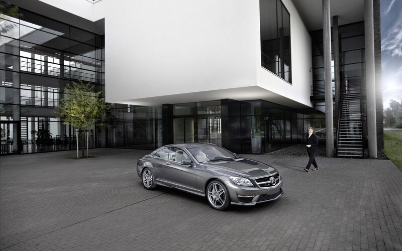 Mercedes-Benz CL63 AMG in front of modern building
