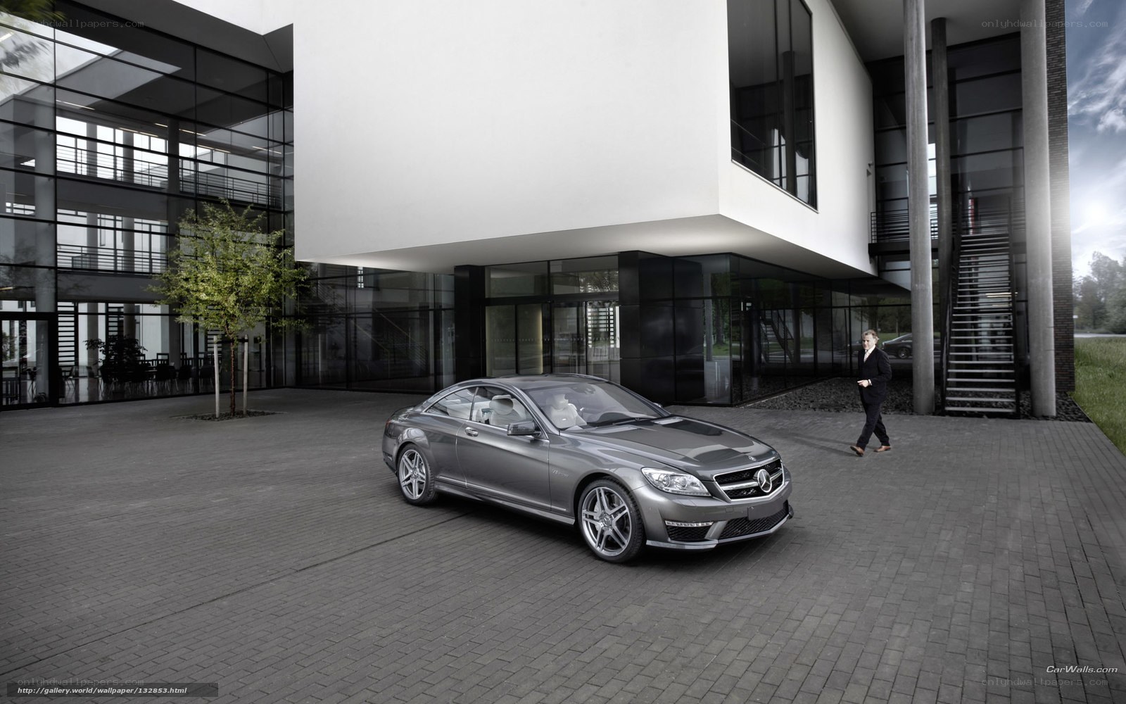 Mercedes-Benz CL63 AMG in front of modern building