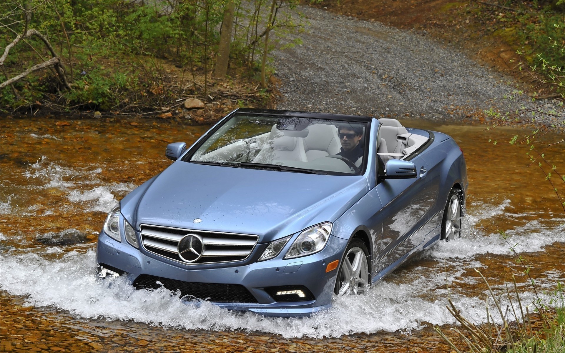 Mercedes-Benz convertible crossing stream
