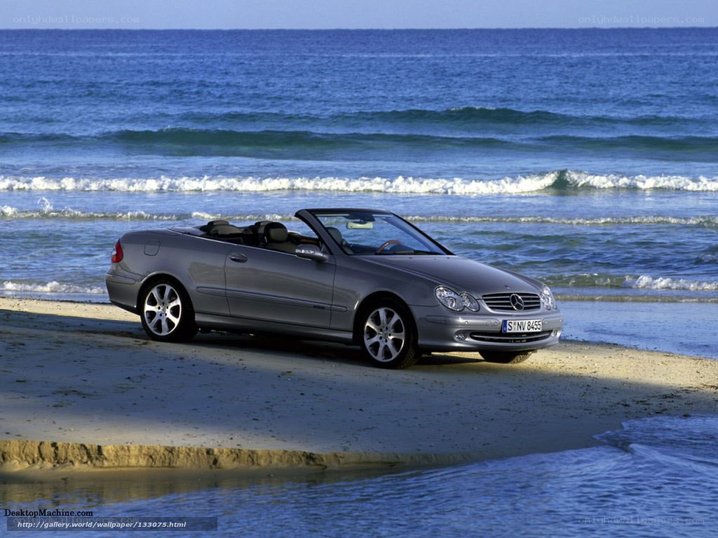 Mercedes-Benz convertible on beach
