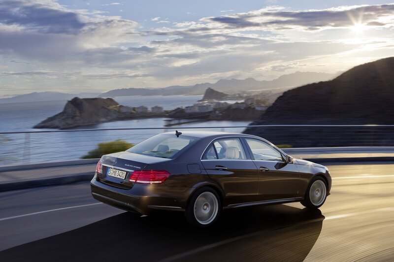 Mercedes-Benz E-Class driving on coastal road