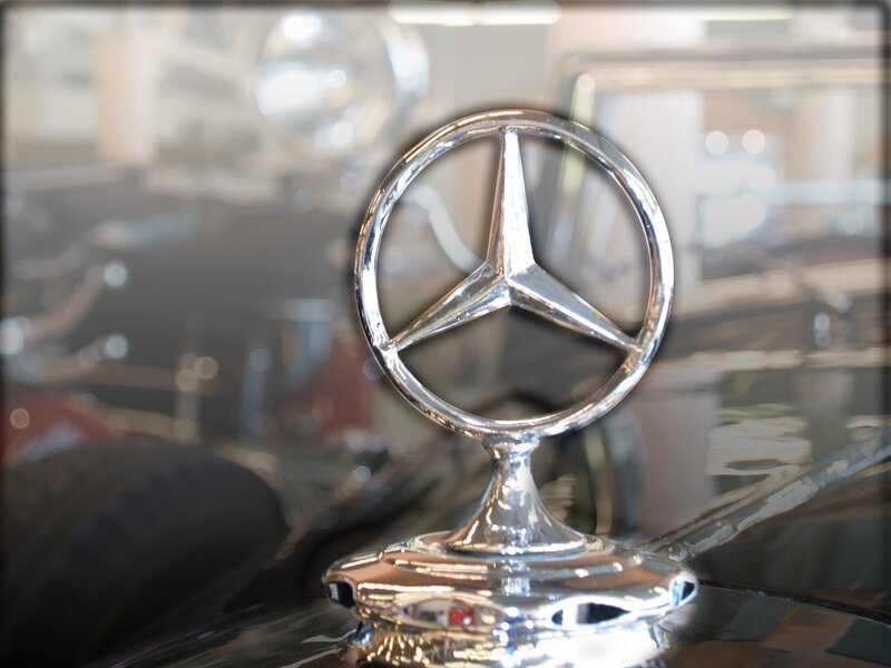 Mercedes-Benz emblem on car hood