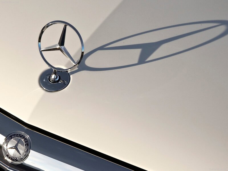 Mercedes-Benz emblem on car hood