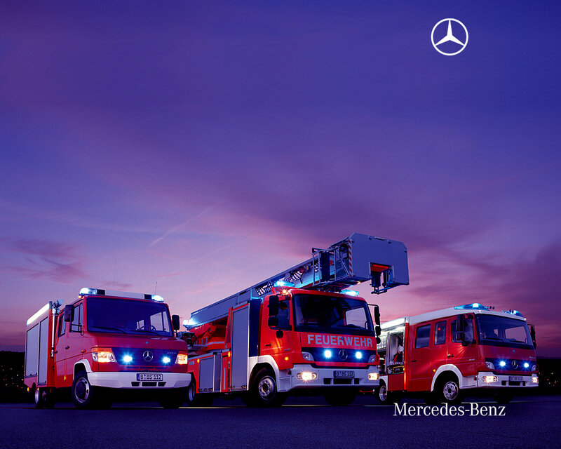 Mercedes-Benz fire trucks at dusk
