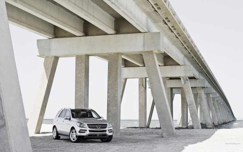 Mercedes-Benz ML parked under a bridge
