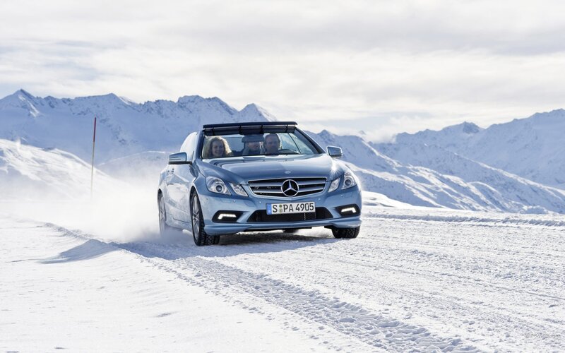 Mercedes-Benz on snowy mountain road