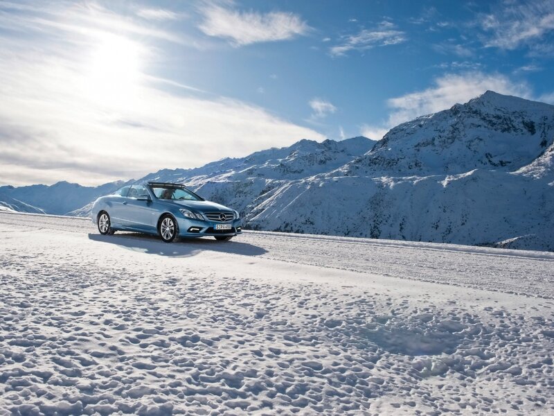Mercedes-Benz on snowy mountain road