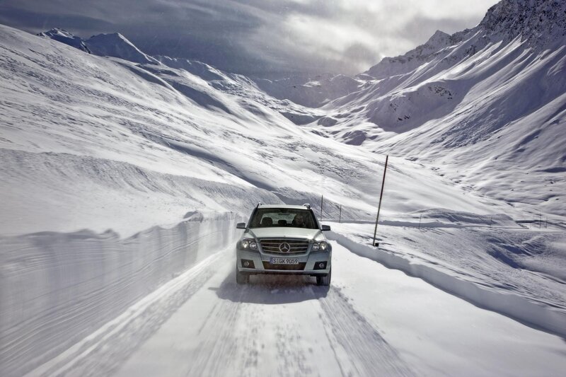 Mercedes-Benz on snowy mountain road