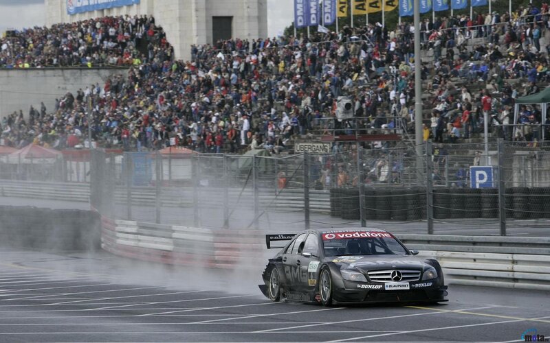 Mercedes-Benz racing on a wet track