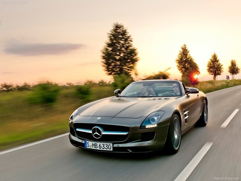 Mercedes-Benz SLS AMG driving at sunset