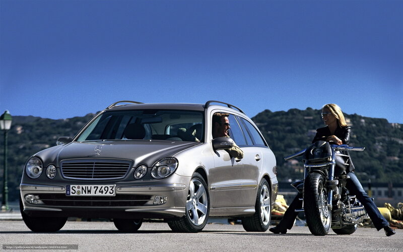 Mercedes-Benz station wagon with motorcycle
