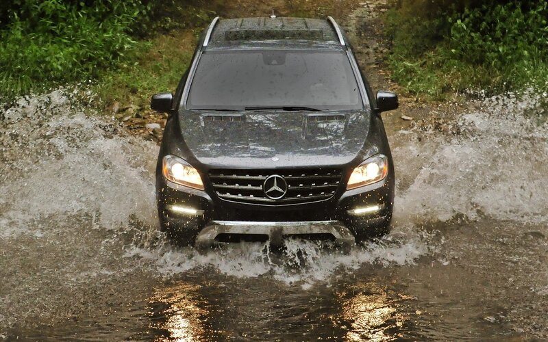 Mercedes-Benz SUV driving through water