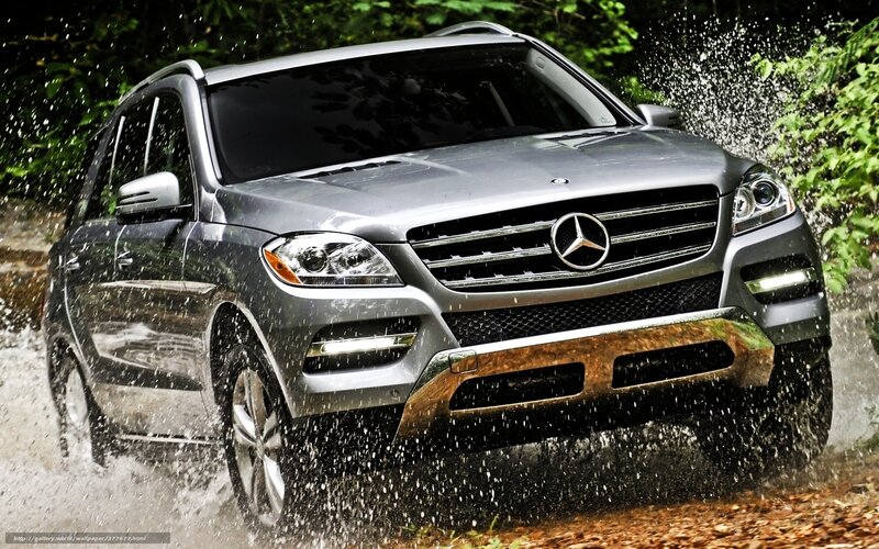 Mercedes-Benz SUV driving through water