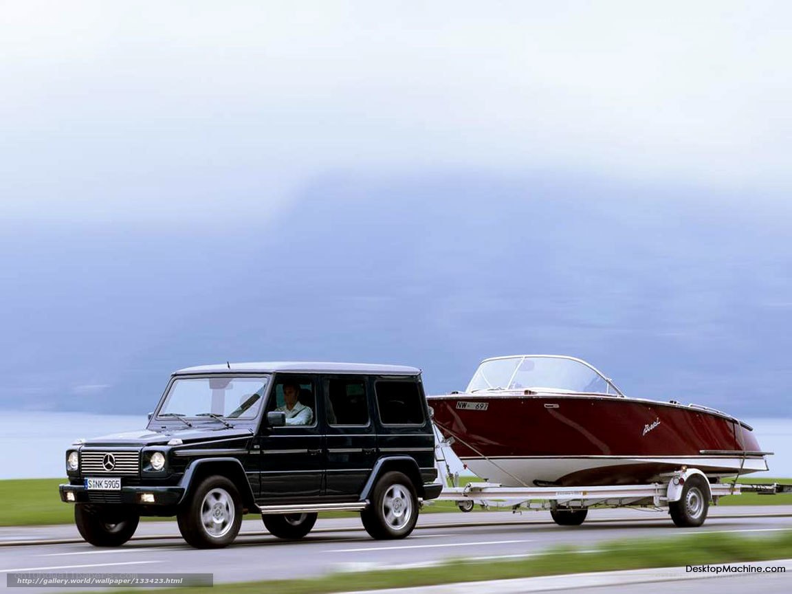 Mercedes G-Wagon towing boat