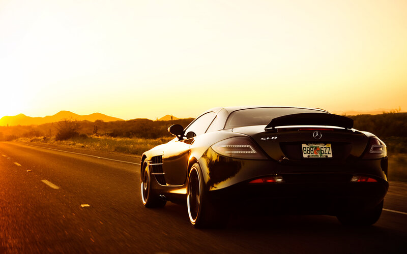 Mercedes SLR driving at sunset