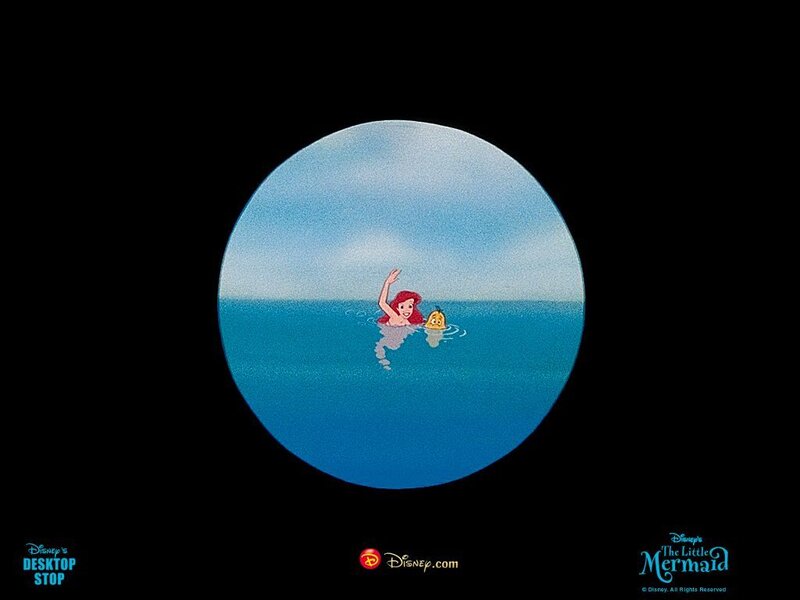 Mermaid and Fish in Ocean