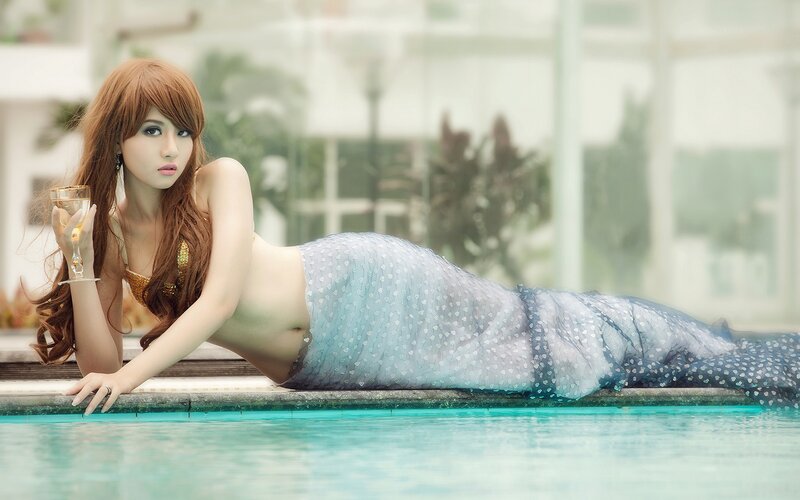 mermaid by poolside