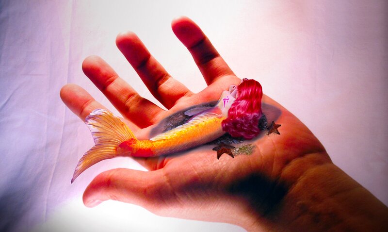 Mermaid Figurine in Hand