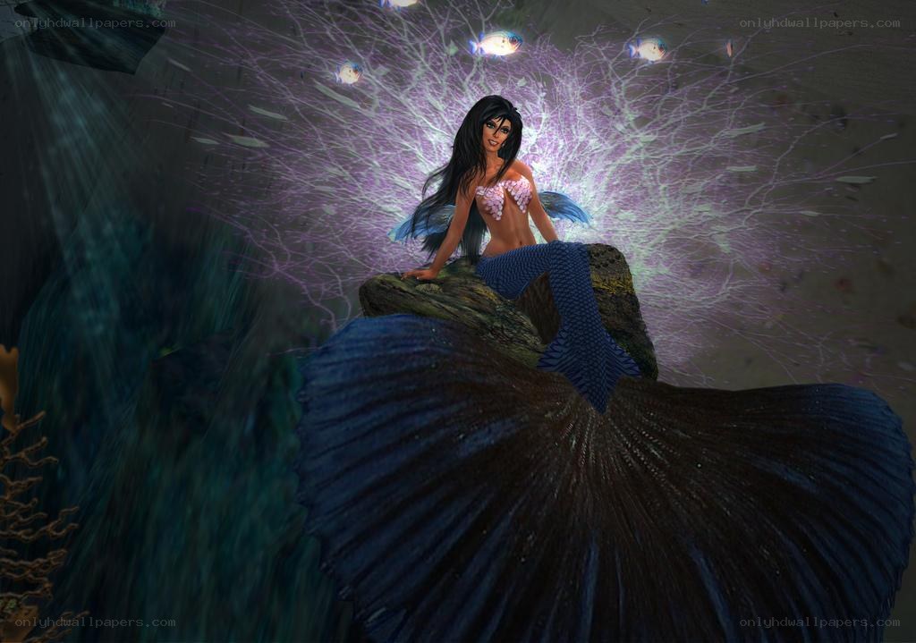 mermaid on a rock underwater