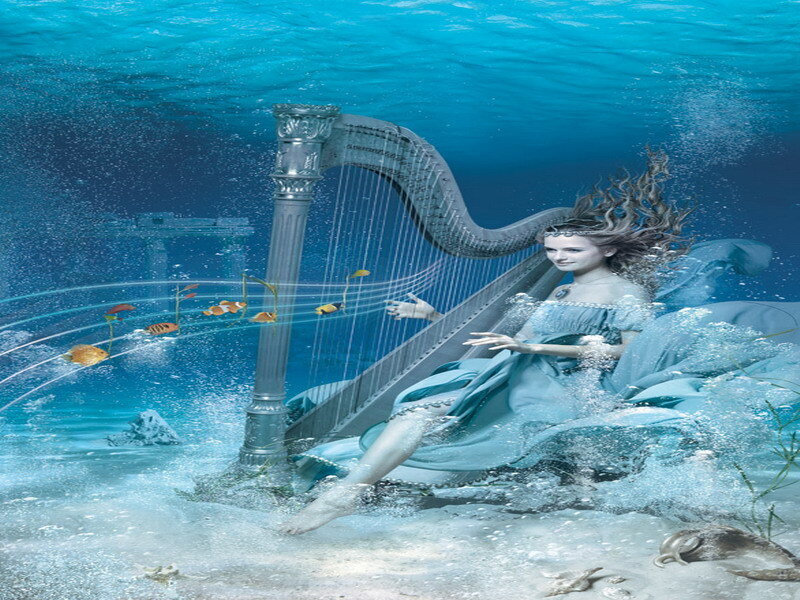 mermaid playing harp underwater