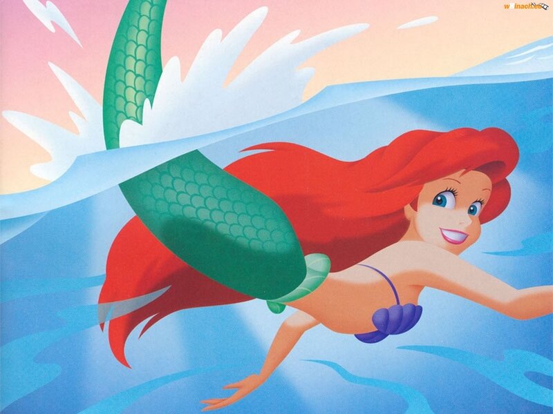 Mermaid Swimming in Water