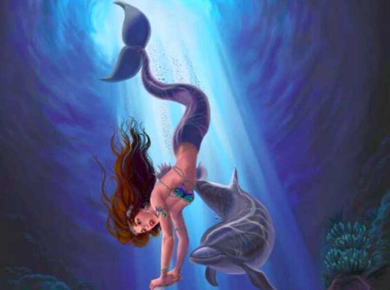 mermaid swimming with dolphin