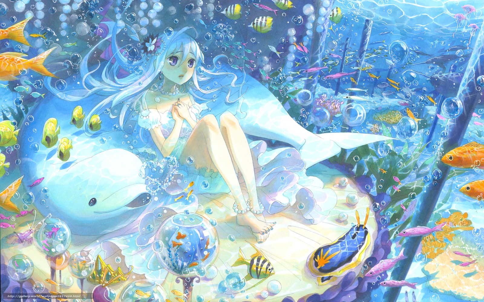 Mermaid with dolphins underwater