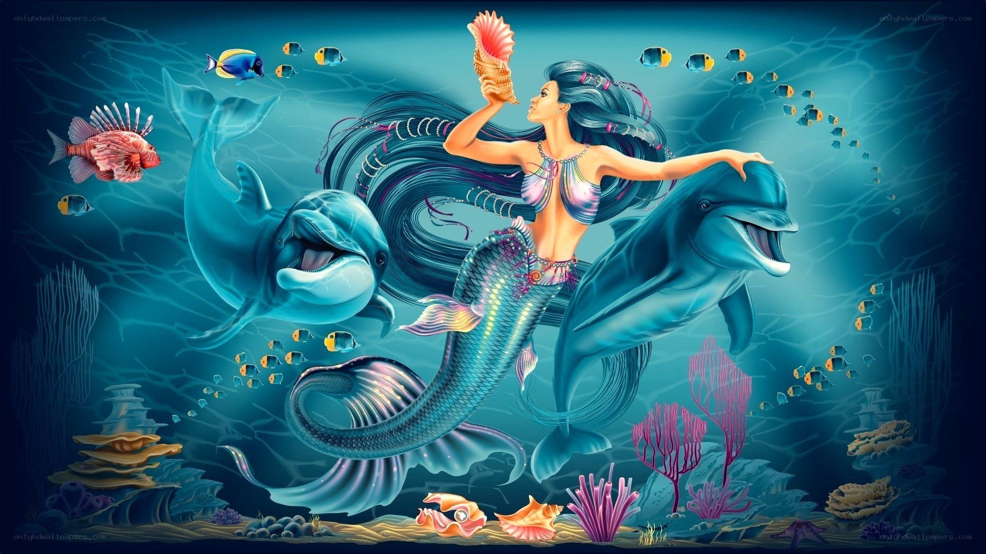 mermaid with dolphins underwater