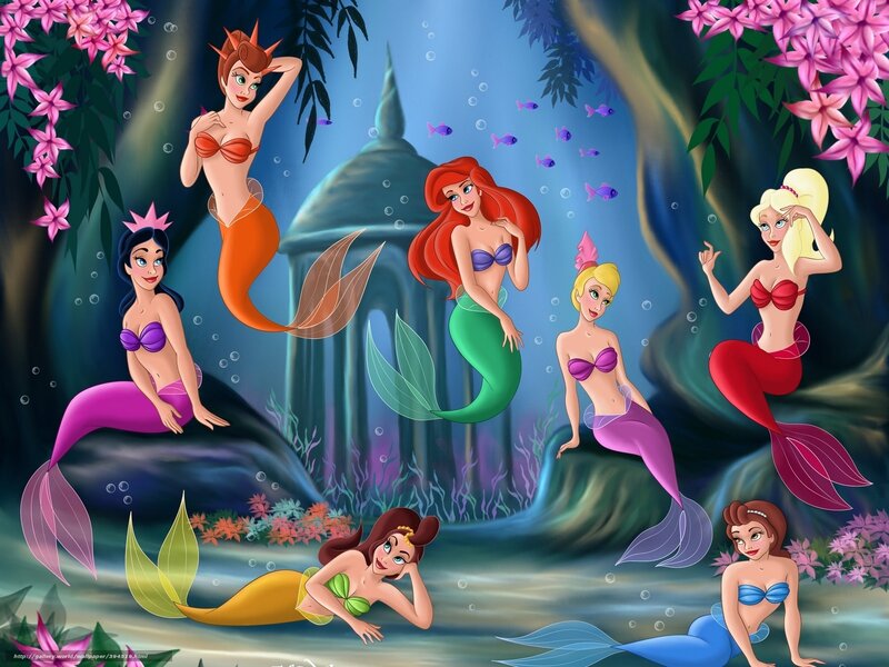 mermaids in underwater garden