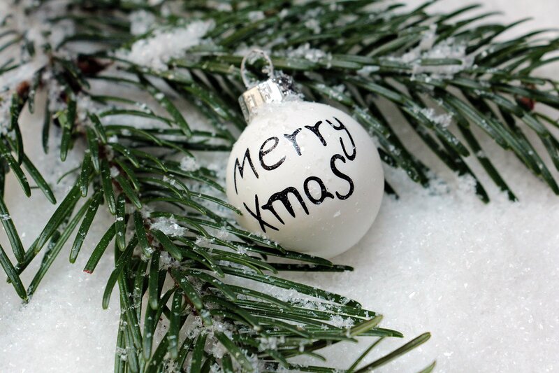 Merry Xmas ornament on snow