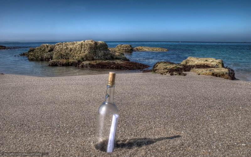 message in a bottle on beach