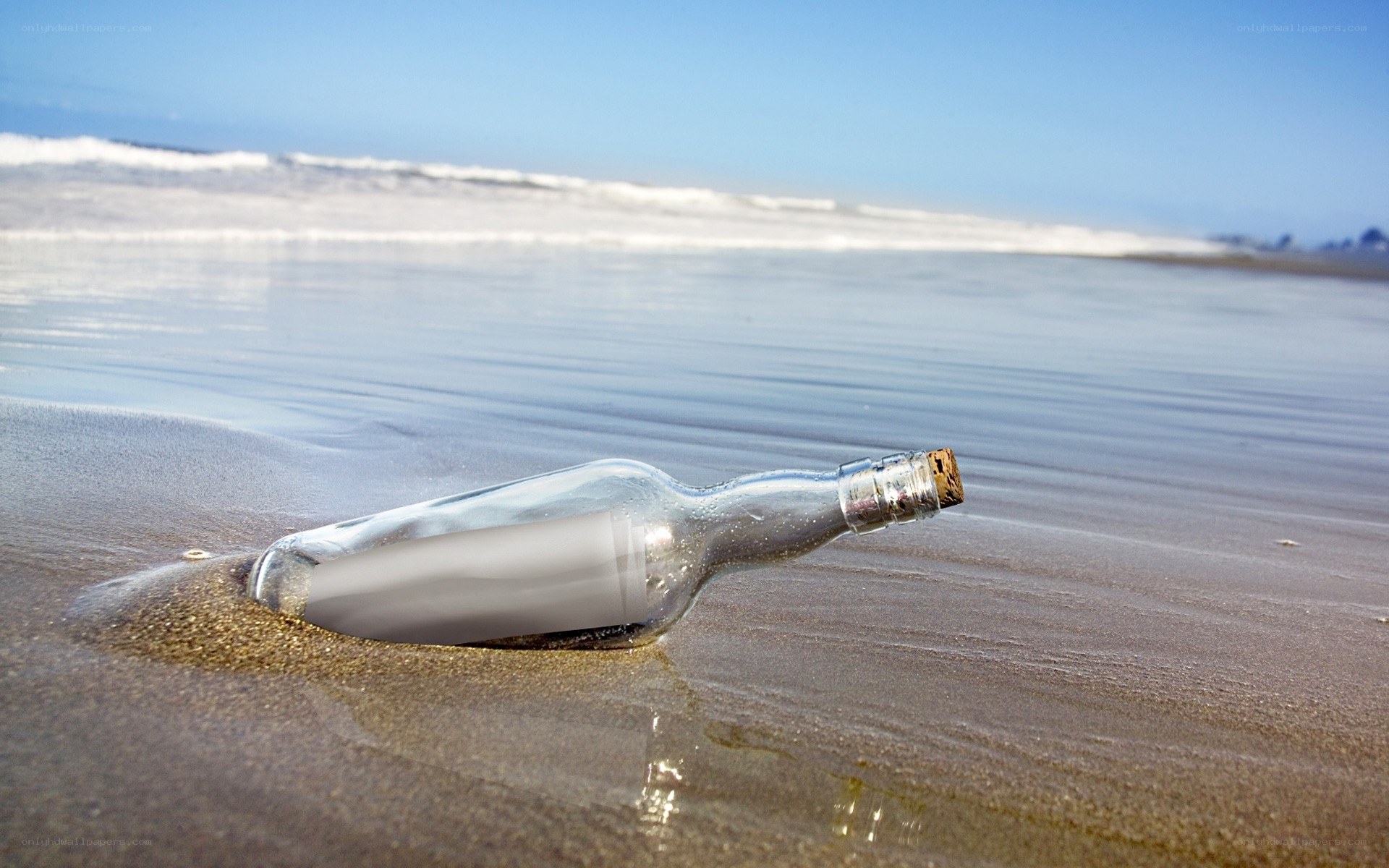 Message in a bottle on beach