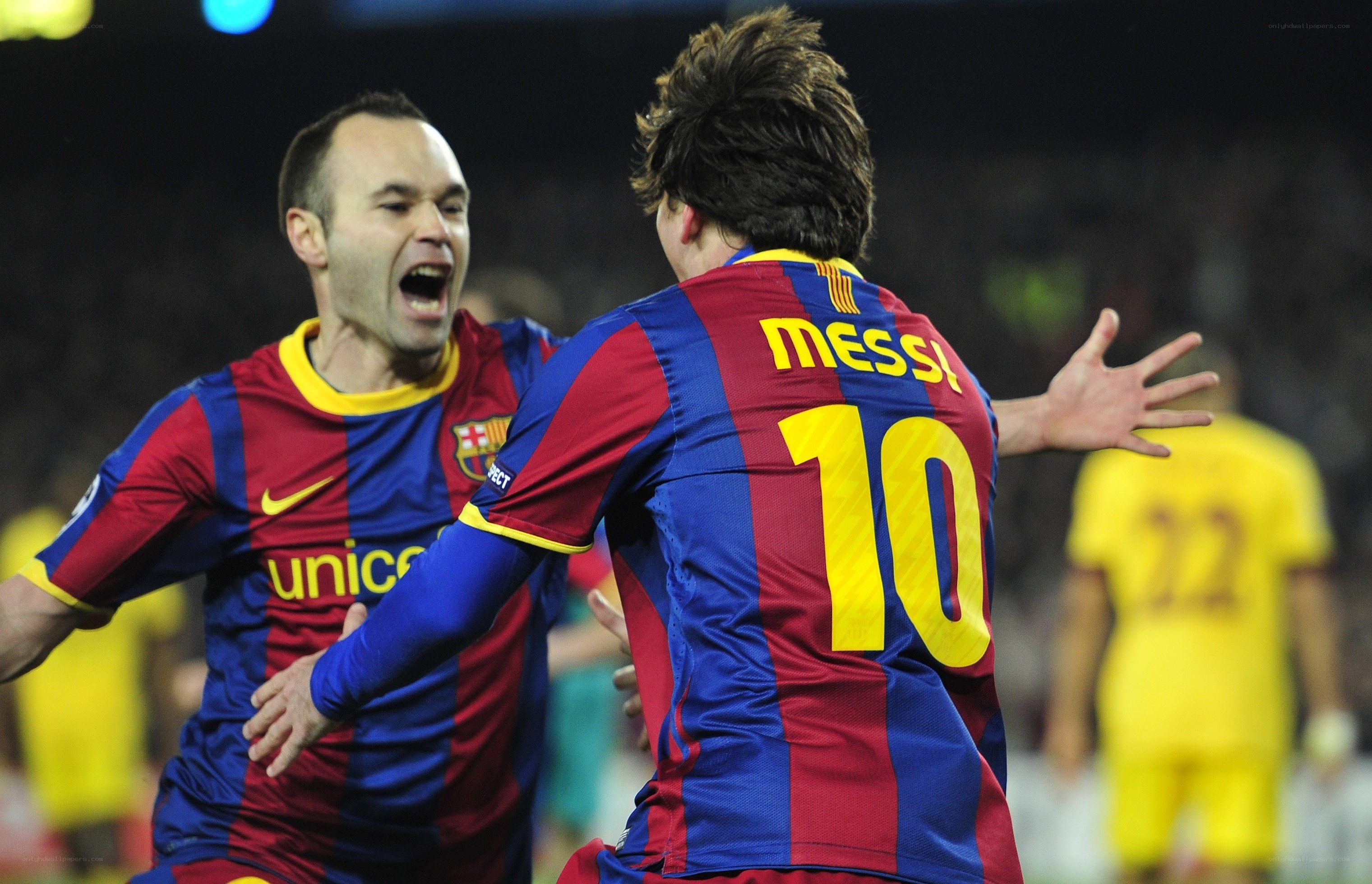 Messi and Iniesta celebrating