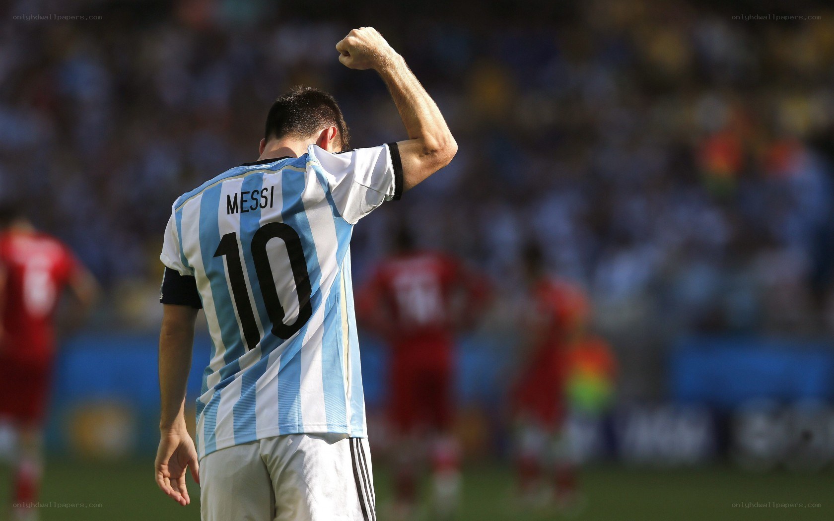 Messi celebrates on field