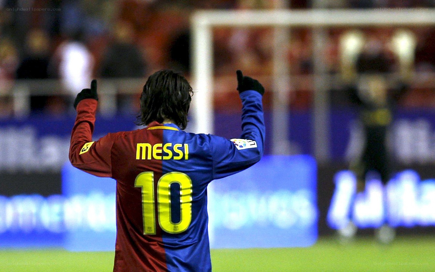 Messi celebrates on the field