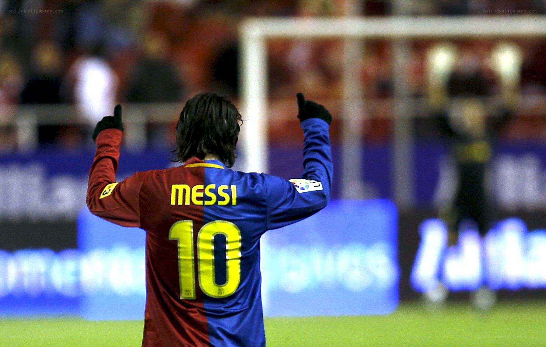 Messi celebrates on the field