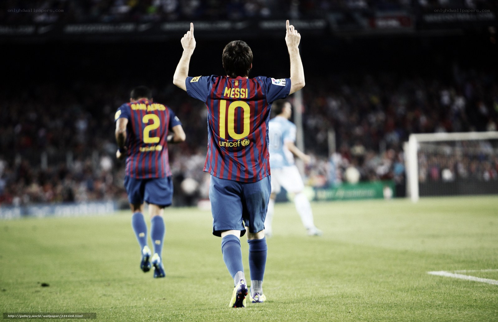 Messi celebrates on the field