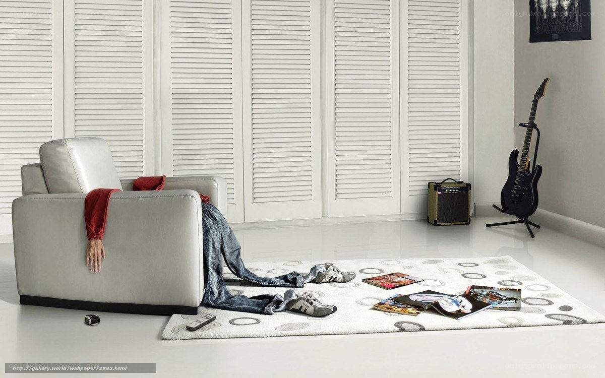 Messy living room with guitar