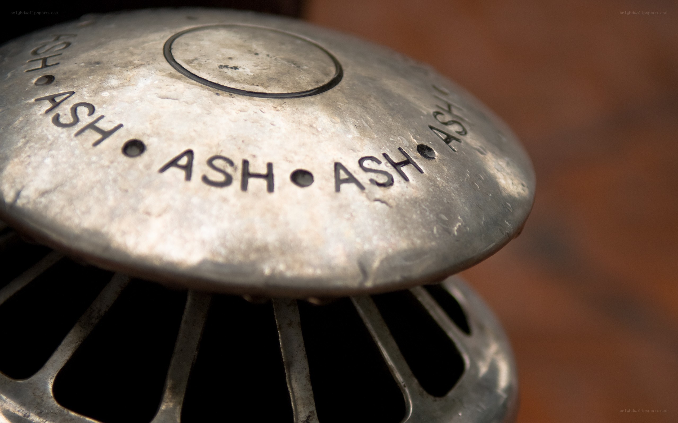 metal ashtray with engraved text
