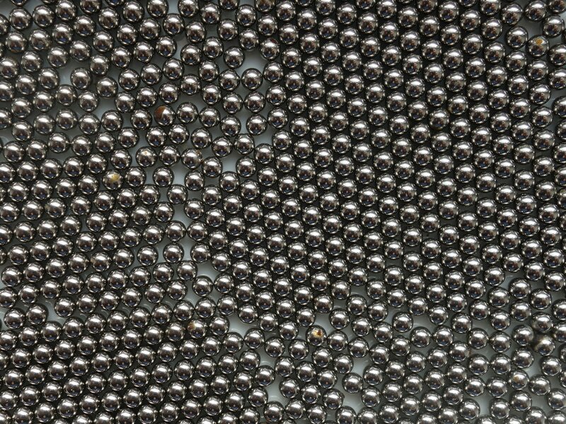 metal balls scattered on surface