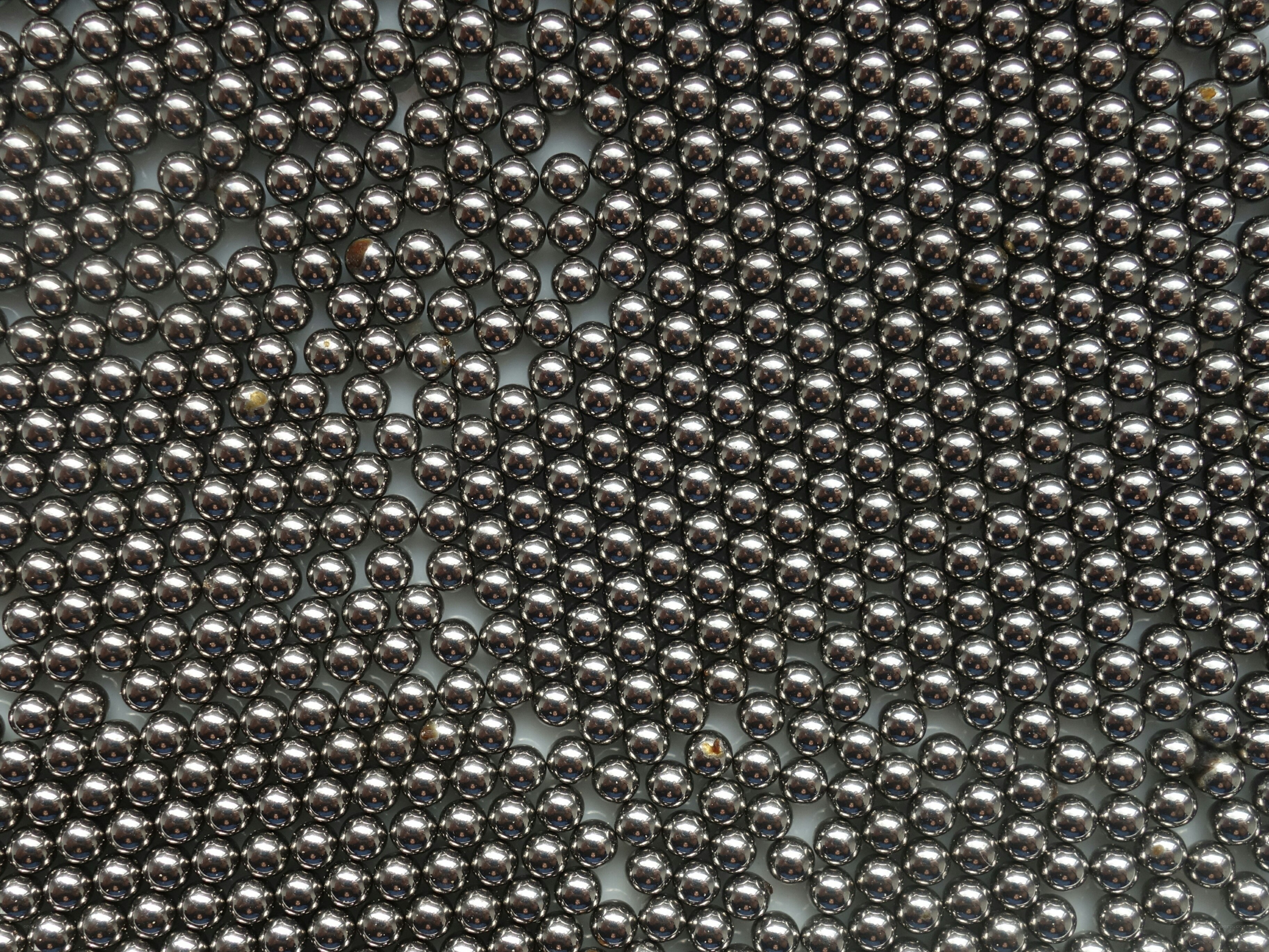 metal balls scattered on surface
