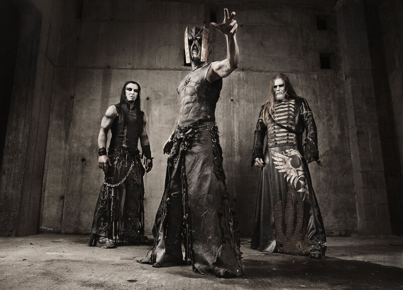 metal band in dark costumes