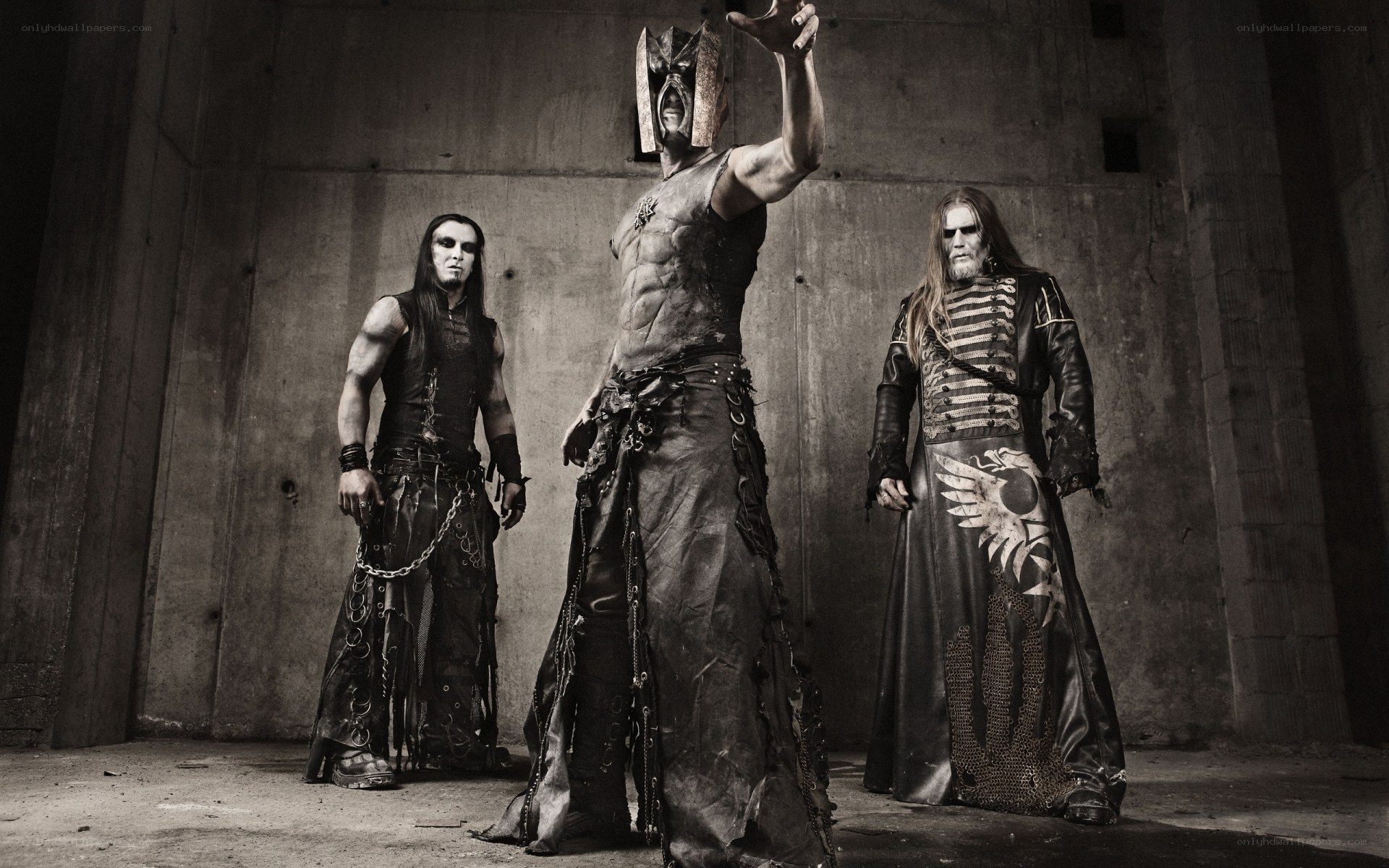 metal band in dark costumes