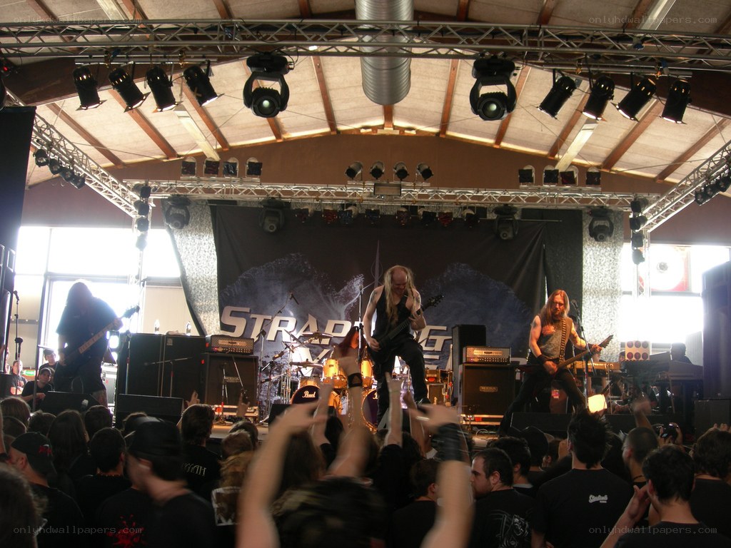 Metal band performing live