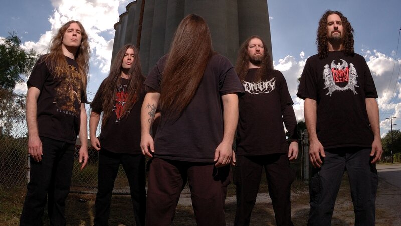 metal band posing outdoors