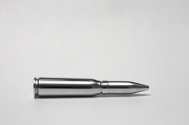 metal bullet-shaped object