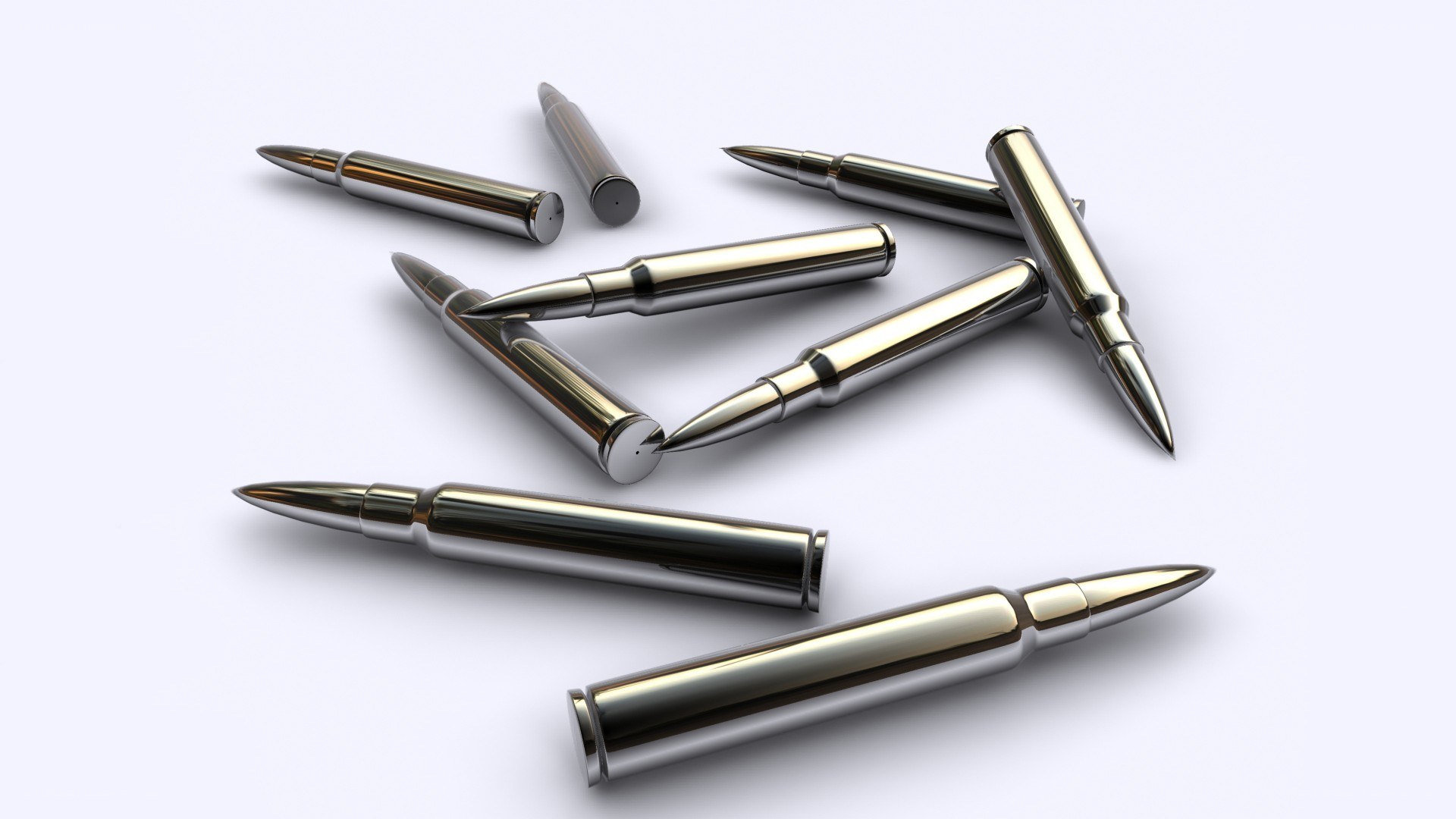 metal bullets on white surface